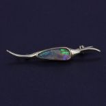 An 18ct yellow gold brooch set with an opal triplet, L. 5cm.
