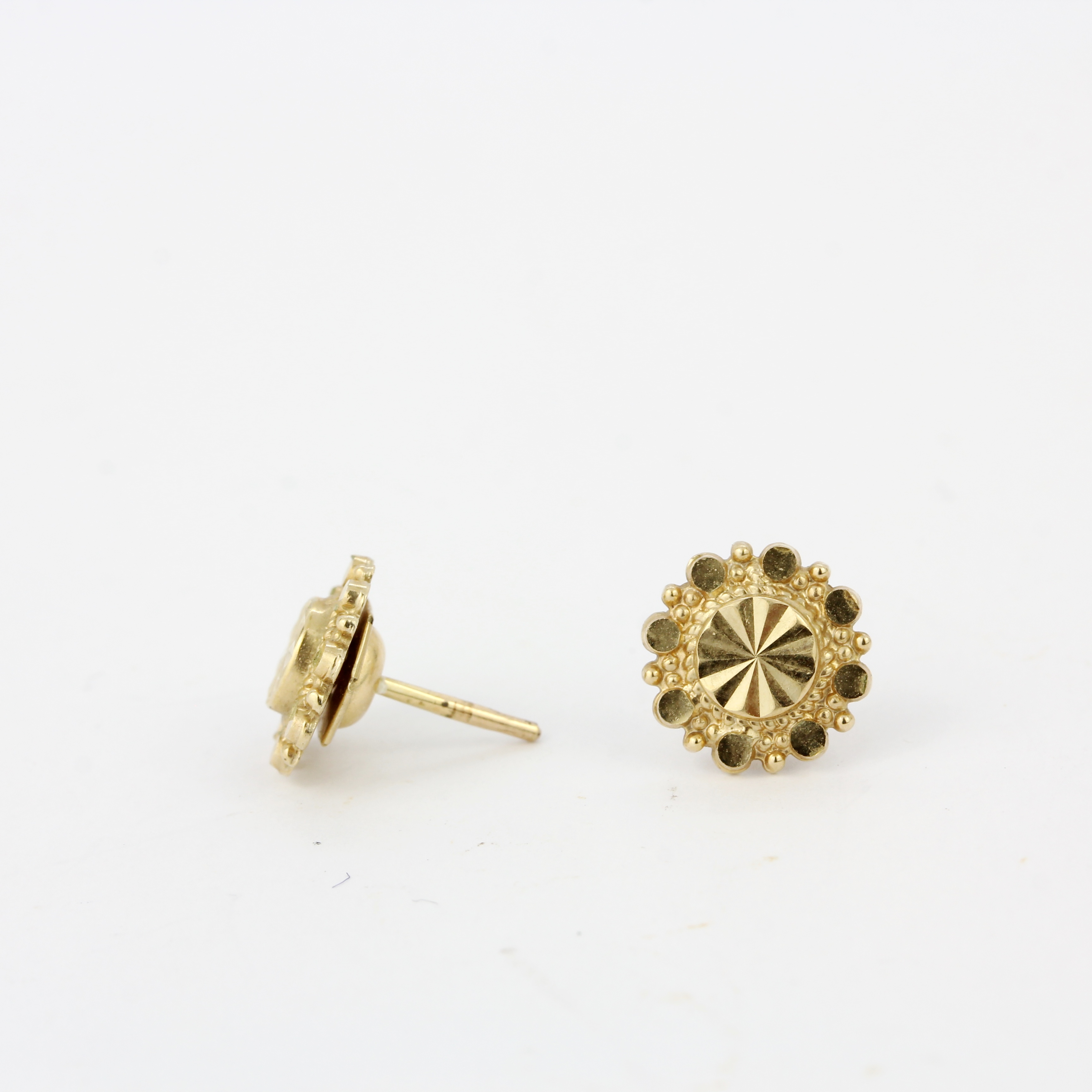 A pair of 9ct yellow gold stud earrings, Dia. 1cm. - Image 2 of 2