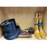 A pair of antique lady's shoe trees together with an Irish moleskin top hat and other items.