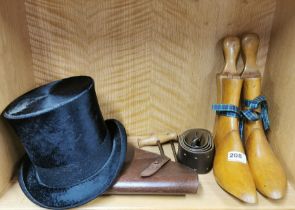 A pair of antique lady's shoe trees together with an Irish moleskin top hat and other items.