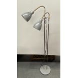 A grey finished floor standing reading light, H. 138cm.