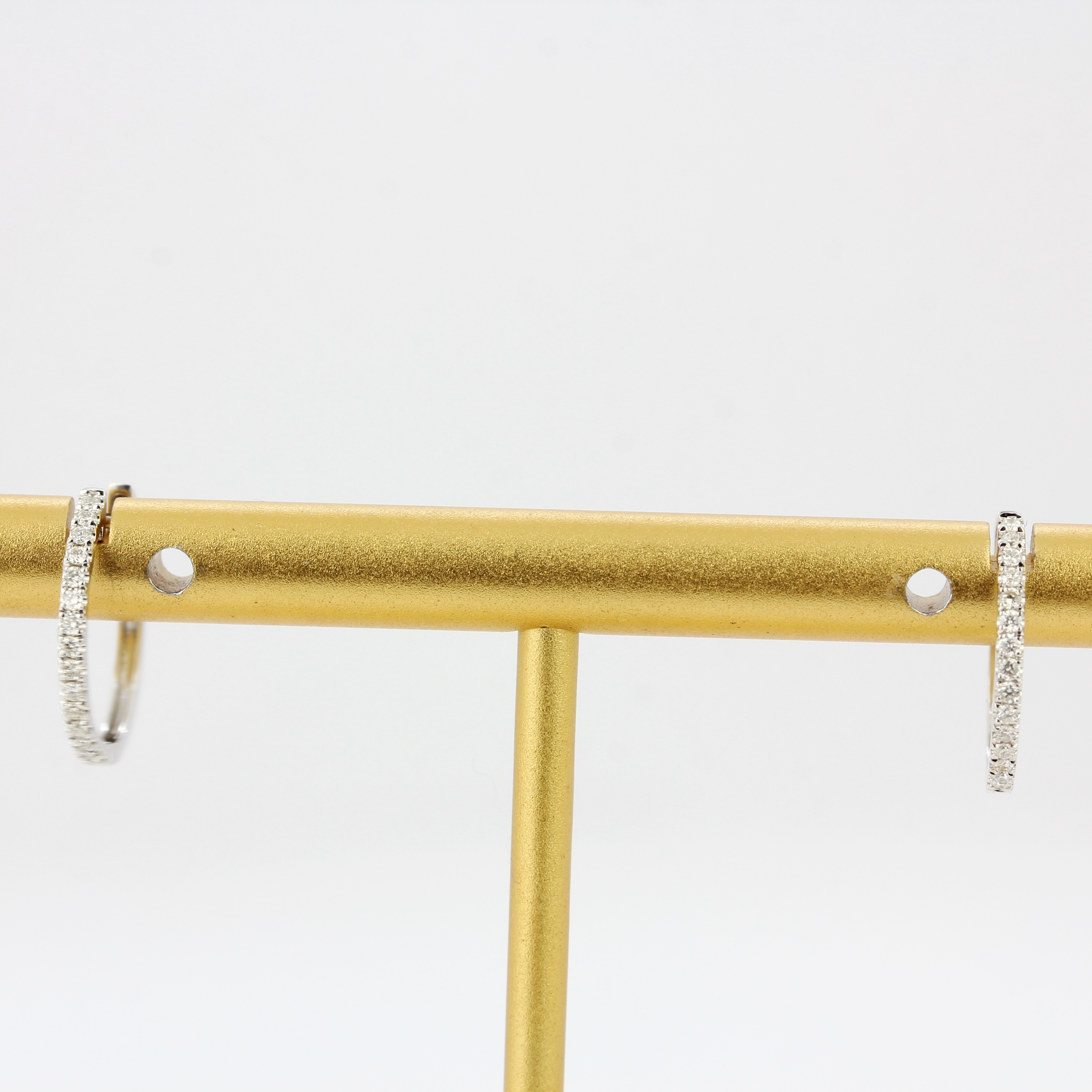 A pair of 18ct white gold diamond set hoop earrings, L. 1.3cm. - Image 2 of 4