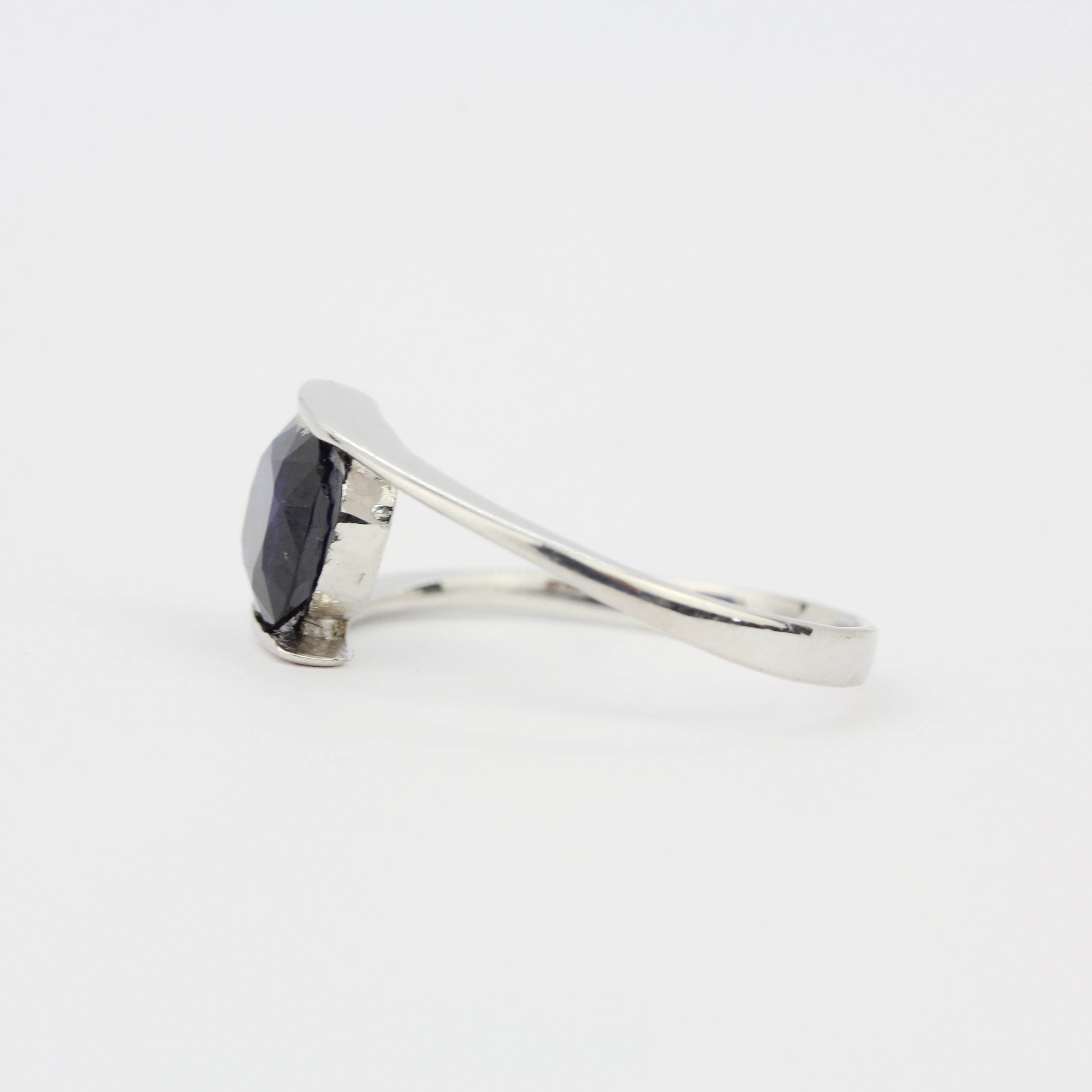 An 18ct white gold (tested) ring set with a 1.9ct cushion cut royal blue sapphire, ring size L. - Image 2 of 3