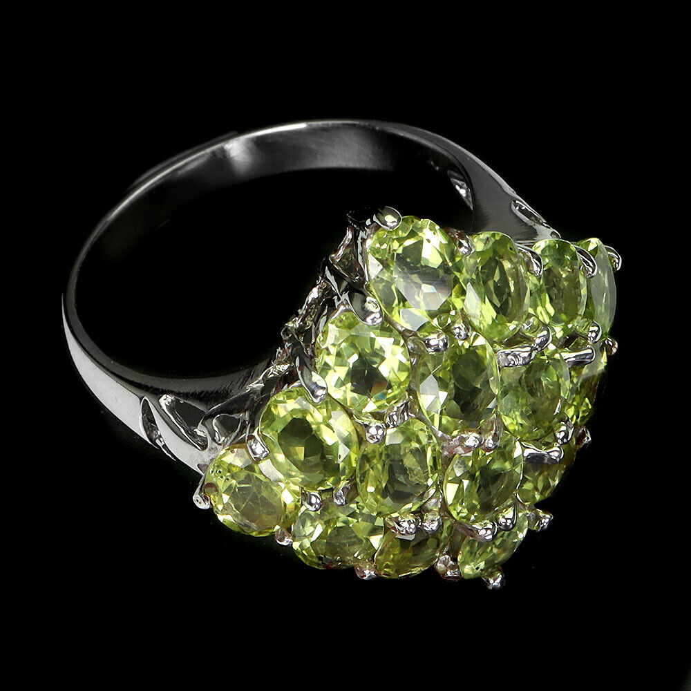 A 925 silver ring set with oval cut peridots, ring size P. - Image 3 of 3