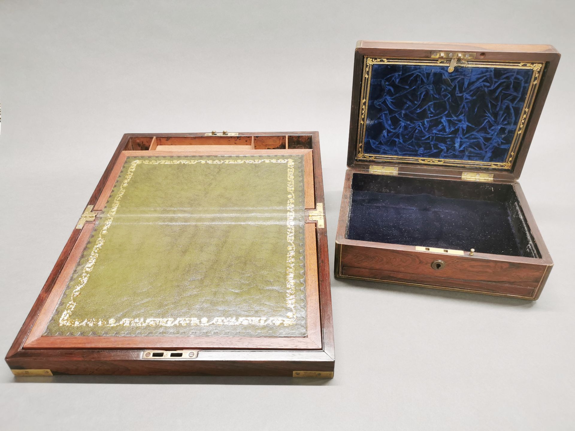 A brass bound mahogany writing slope with a 19thC brass bound rosewood veneered box with secret