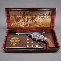 A boxed working action inert retrospective copy of a colt single action army revolver, full weight