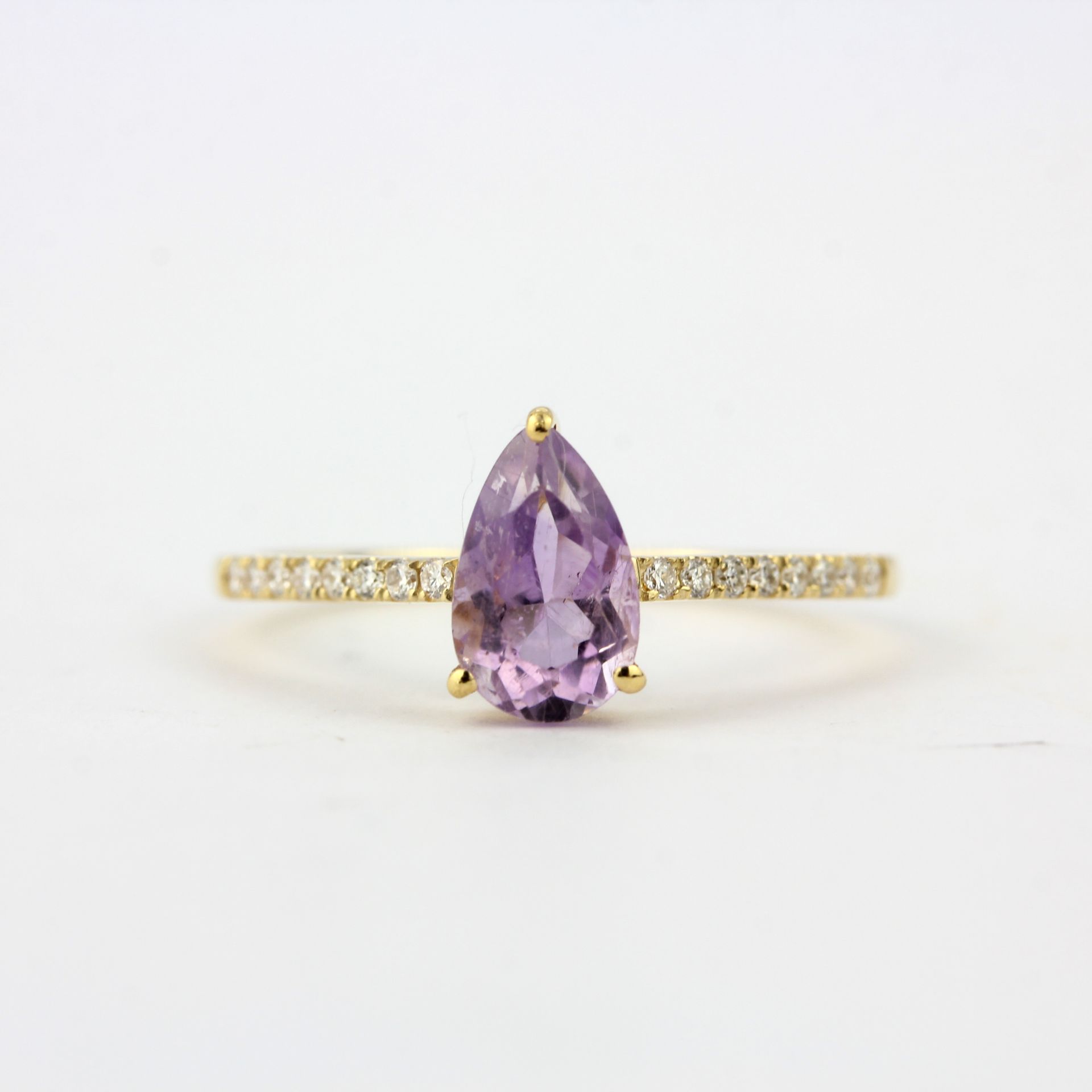 An 18ct yellow gold amethyst and diamond set ring, ring size O.