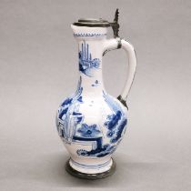 An 18thC pewter mounted German pottery wine ewer with chinoiserie decoration, H. 25cm. Repaired to