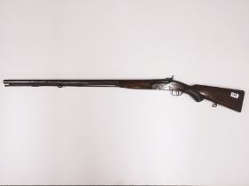 An early 19thC Indian trade musket, L. 125cm.