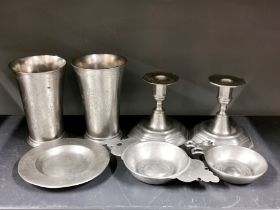 A group of seven good pewter items, beaker H. 15cm