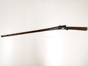 A 19thC antique Indian matchlock musket, L. 153cm.