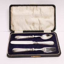 A cased silver handled christening set.
