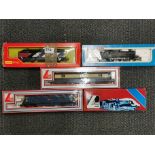 Three boxed Lima 00 gauge locomotives, one Hornby and one Airfix.