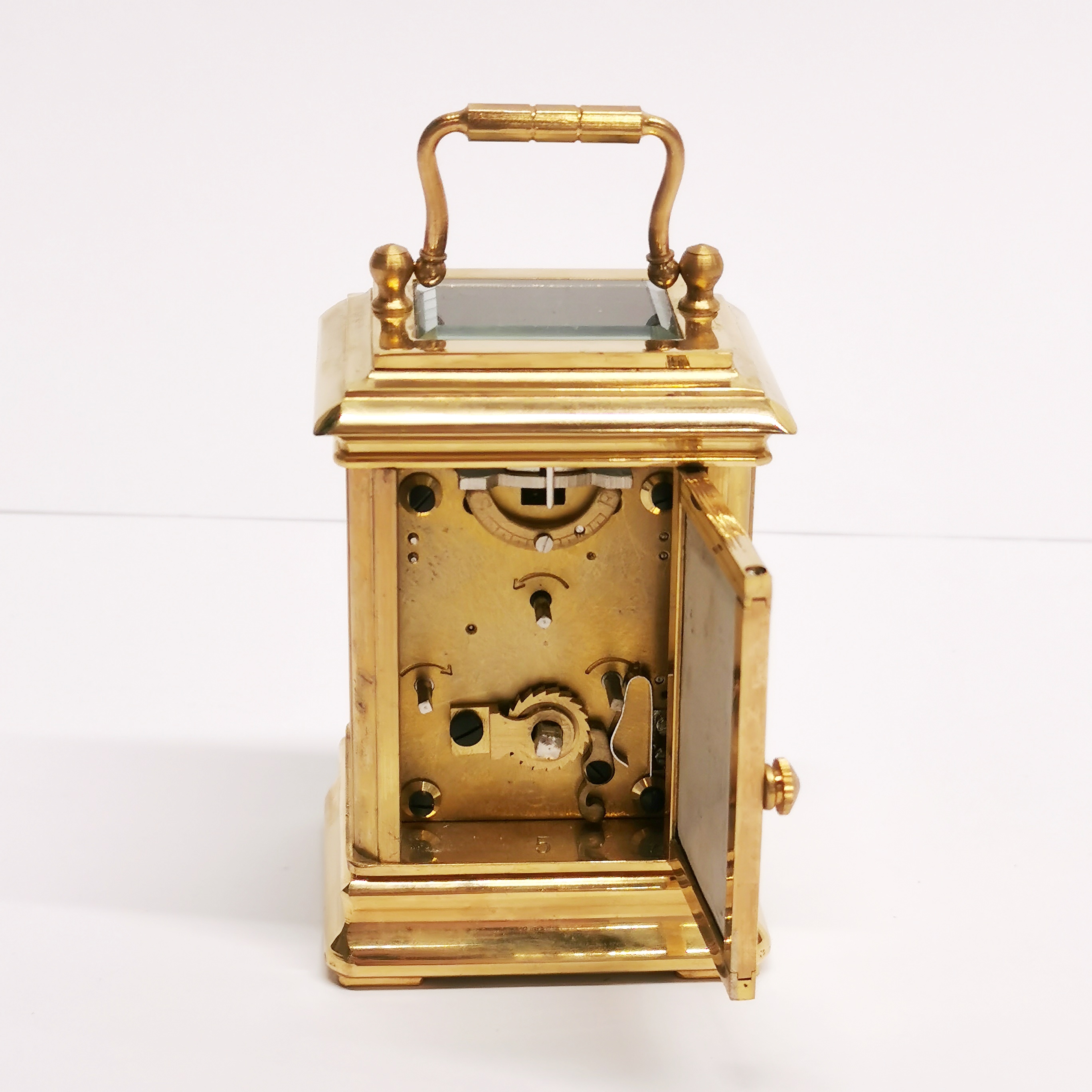 A small gilt brass carriage clock with porcelain panels, H. 10cm. - Image 3 of 3