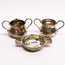 A double pouring hallmarked silver cream jug with sugar bowl and hallmarked silver quaich.