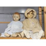 Two antique composition dolls, largest H. 52cm.