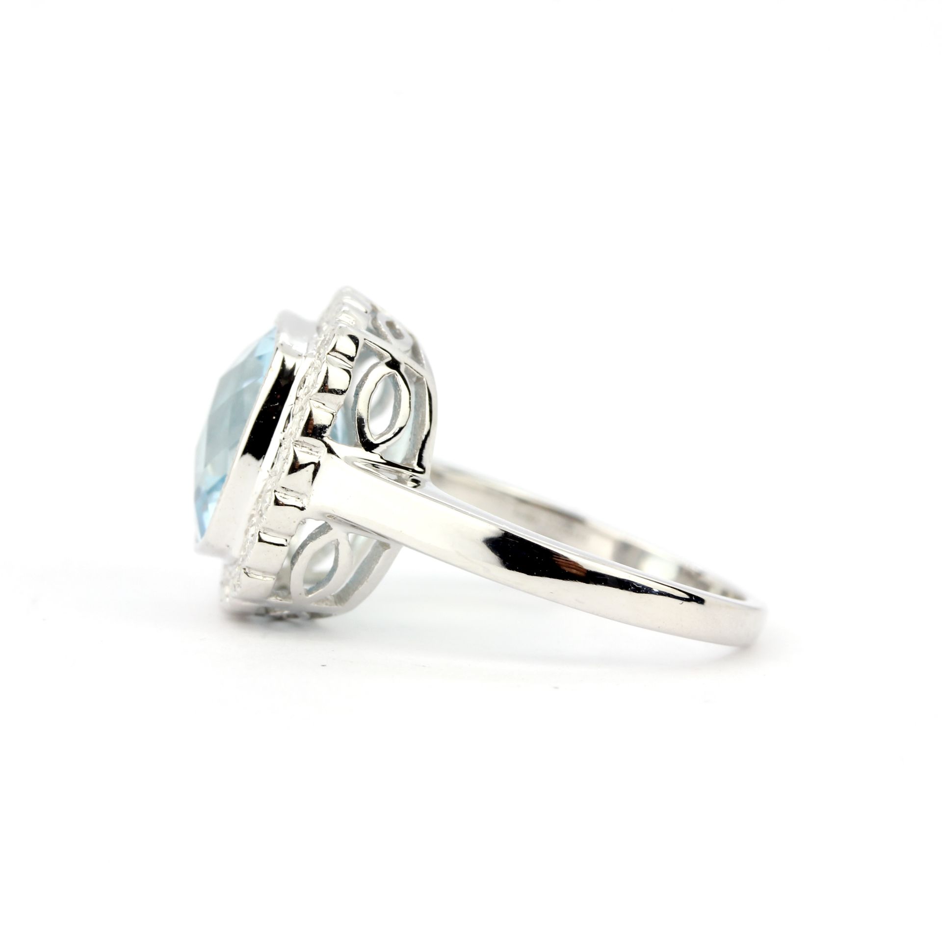 A 9ct white gold ring set with a checker board aquamarine and diamonds, ring size L. - Image 4 of 4