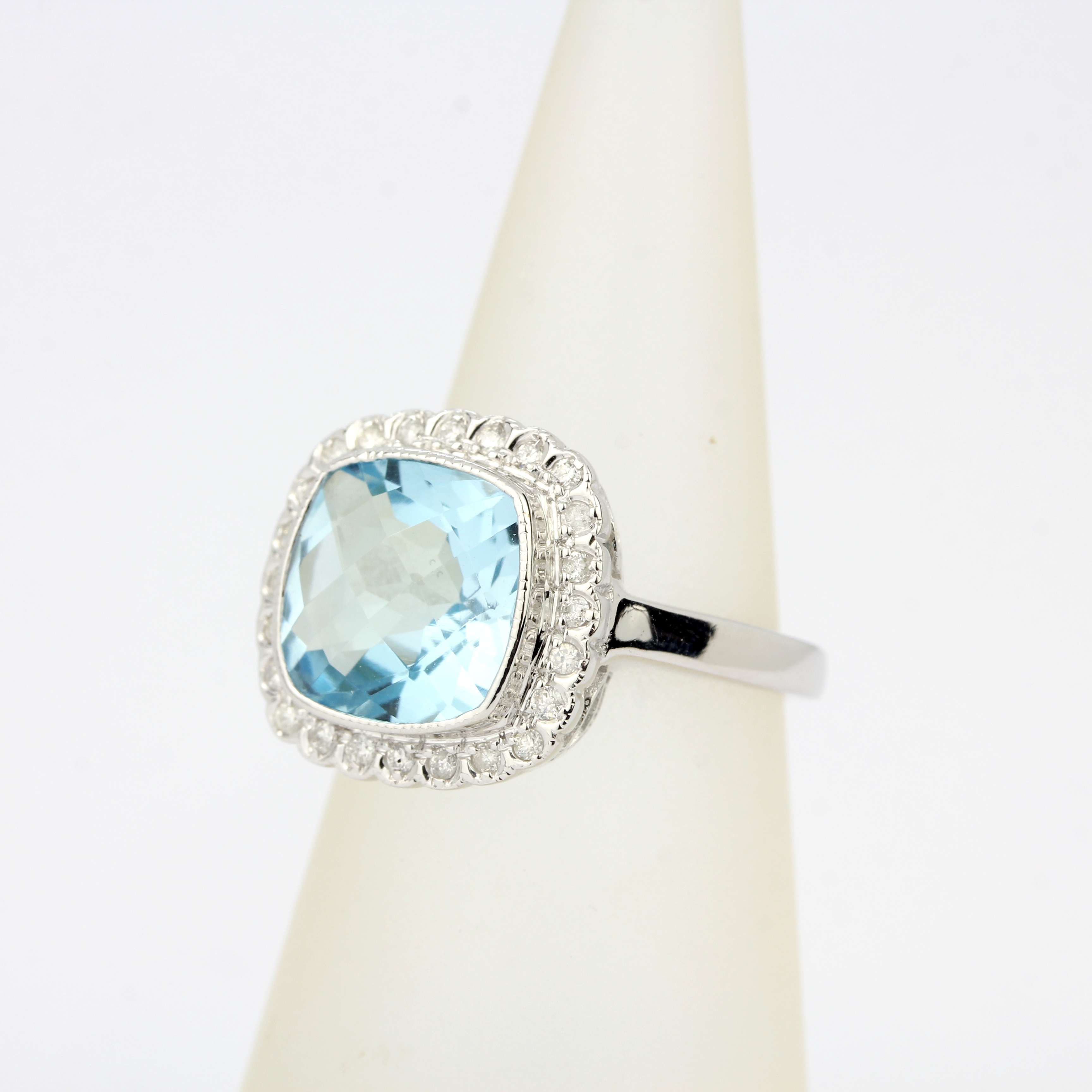 A 9ct white gold ring set with a checker board aquamarine and diamonds, ring size L. - Image 2 of 4