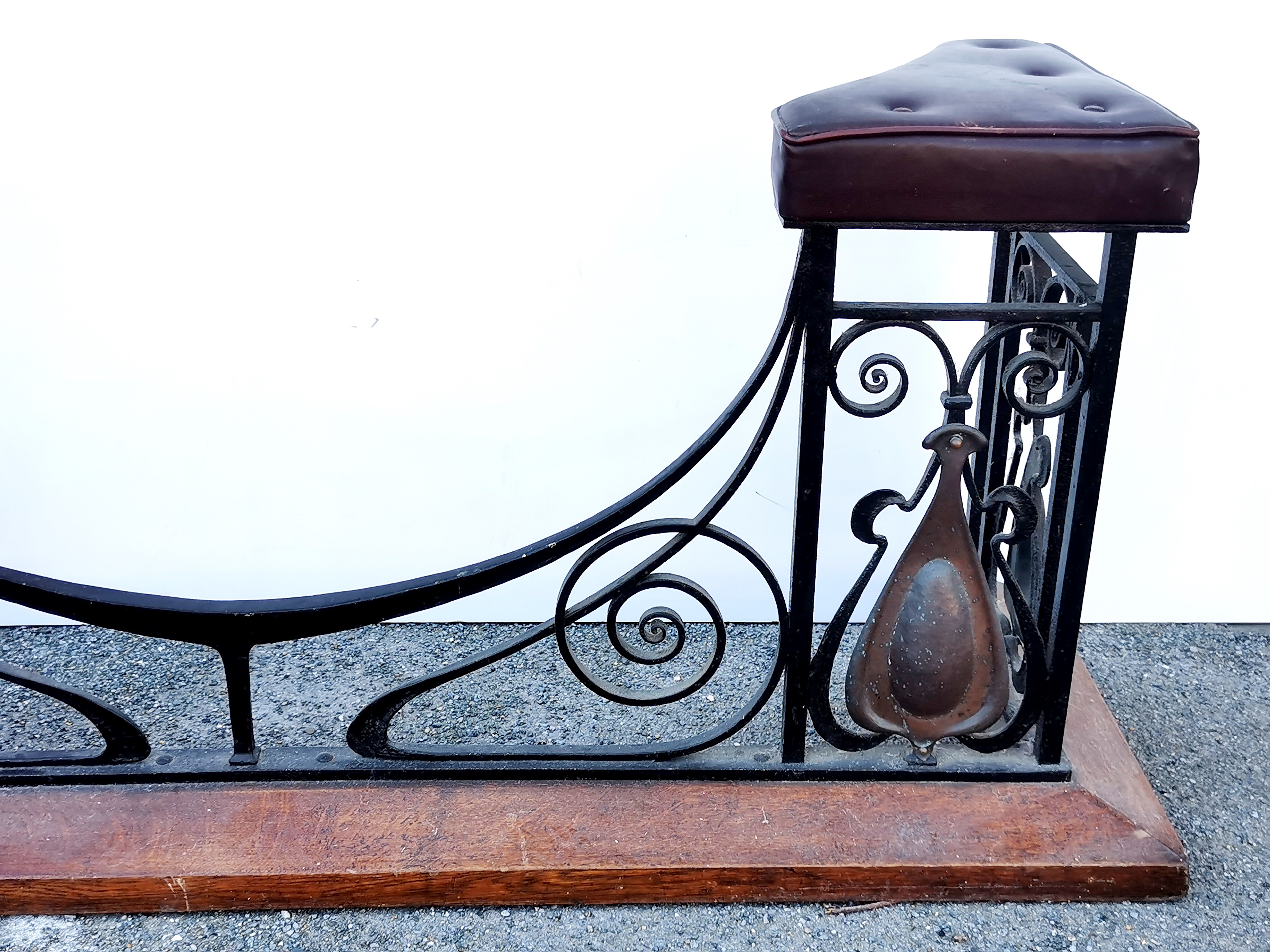 A large Art Nouveau 20thC upholstered iron and oak fireplace fender seat, W. 180cm. - Image 4 of 5