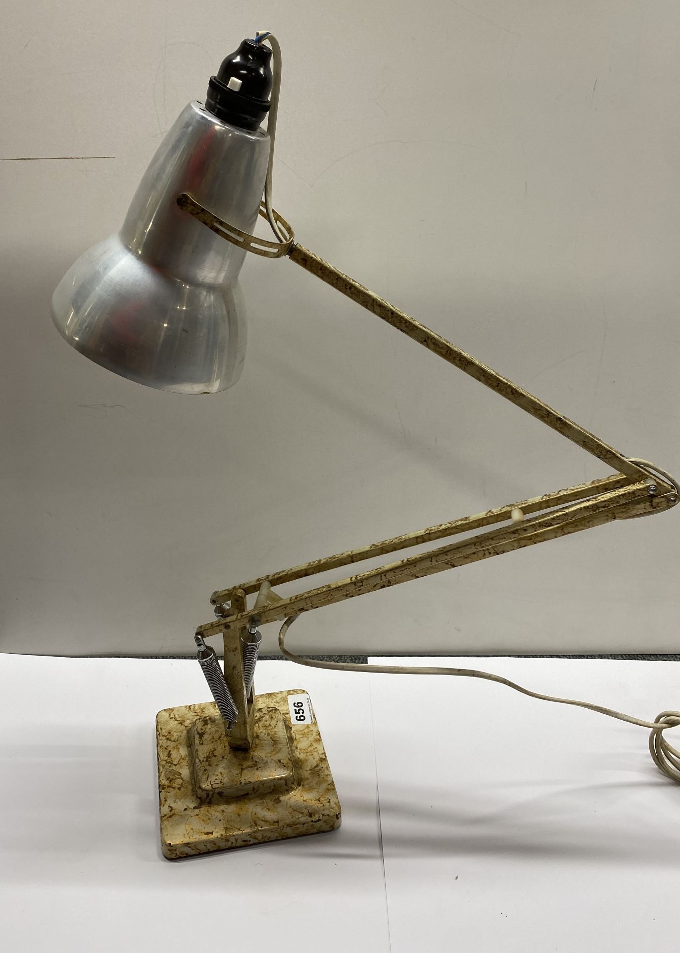 A vintage angle desk lamp.