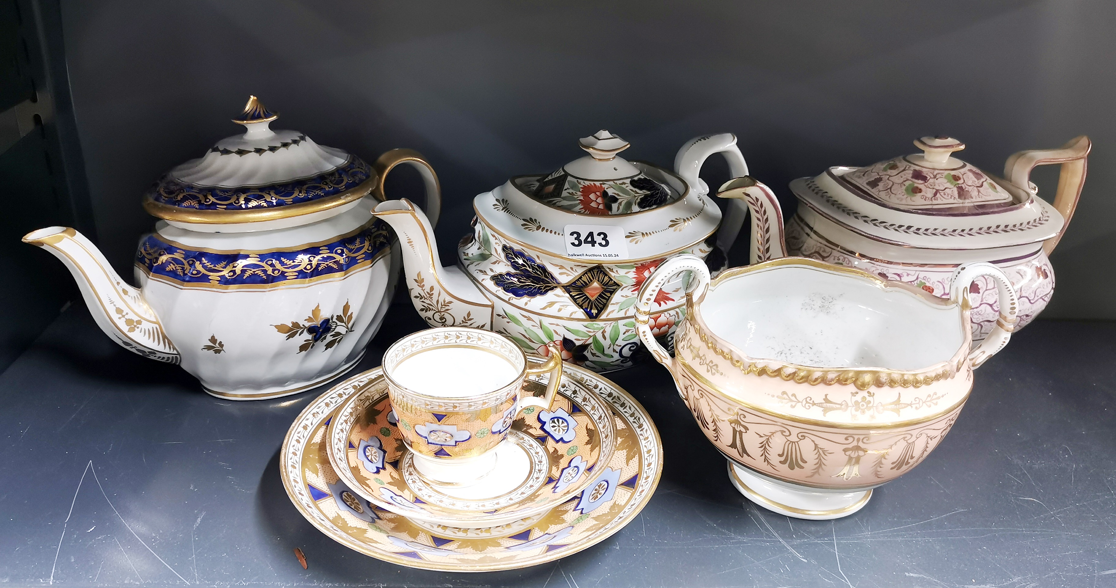 A group of early English porcelain items. Lustre tea pot lid repaired and blue and gold lid