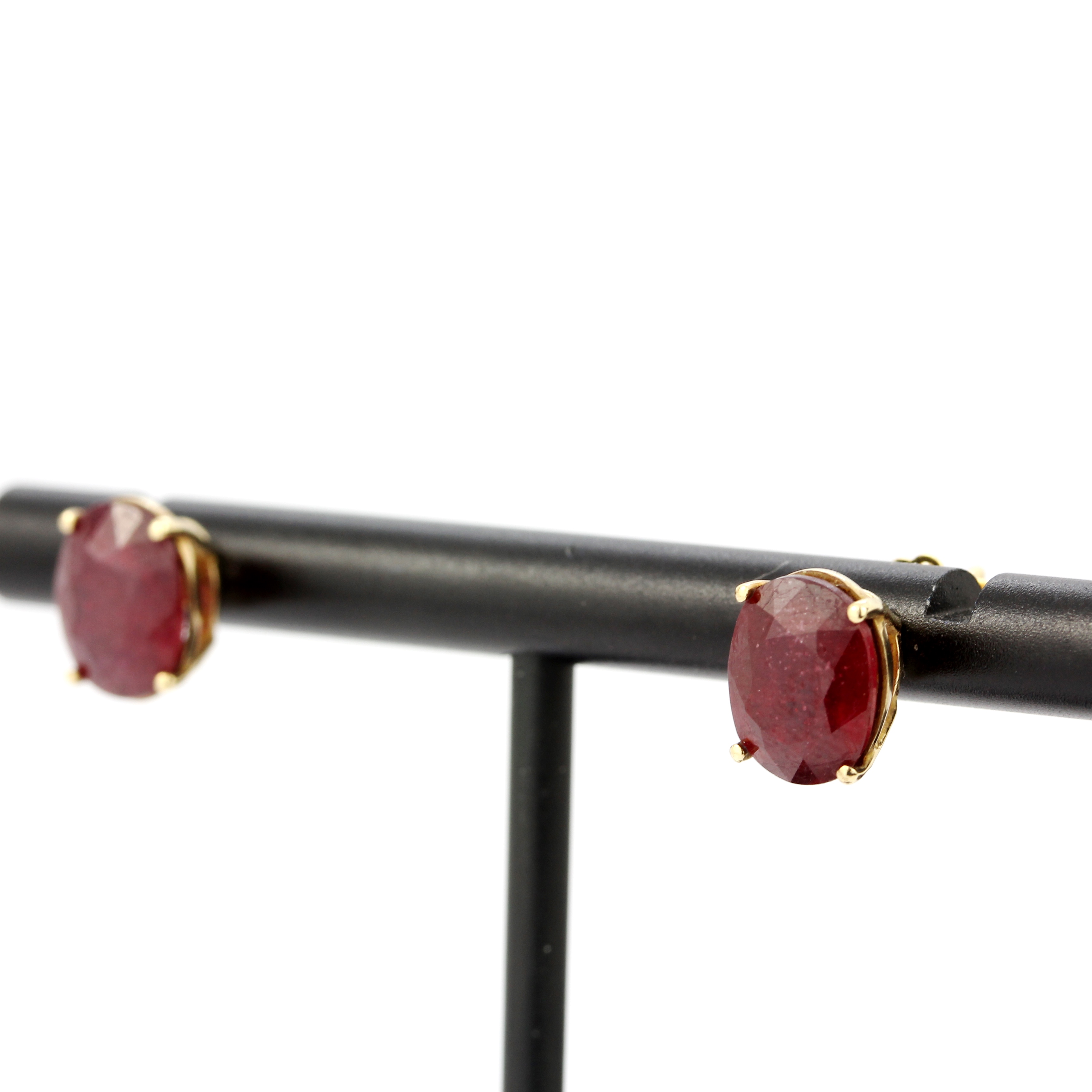 A pair of 9ct yellow gold ruby set stud earrings, L. 0.9cm, one butterfly replaced. - Image 2 of 3
