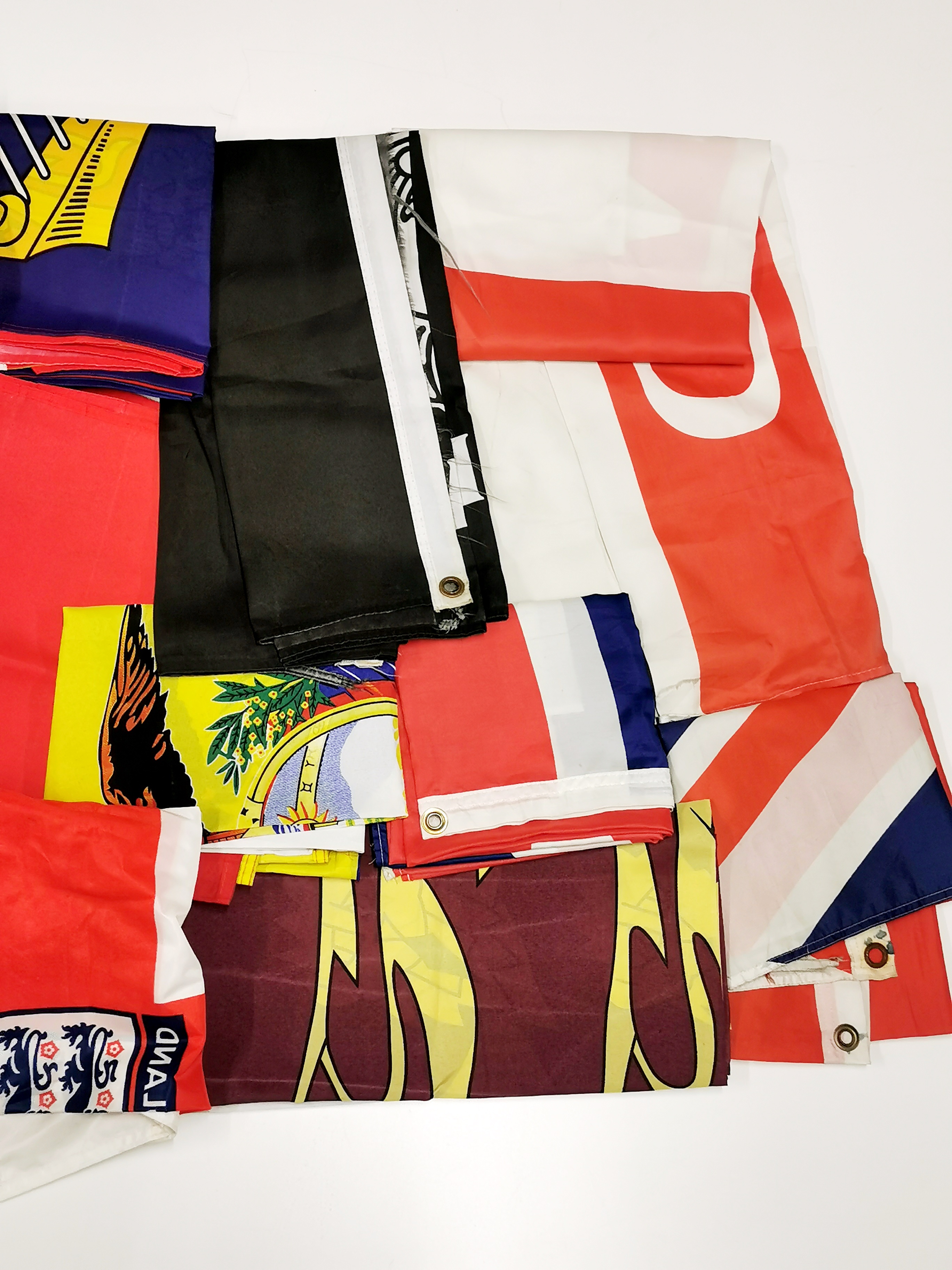 A wooden box of mixed flags and pennants. - Image 2 of 4