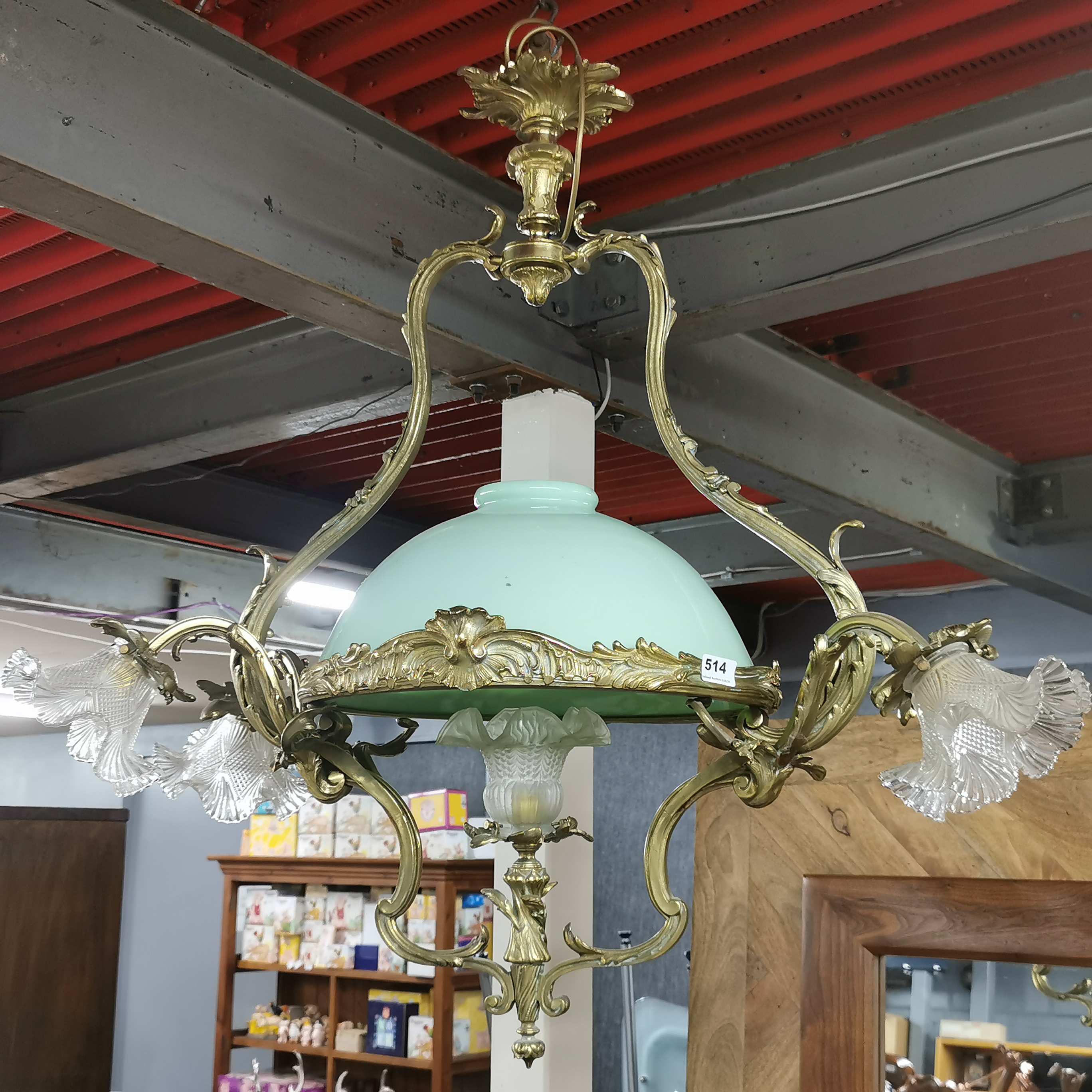 A superb Art Nouveau design brass celling light fitting, H. 90cm, W. 92cm.