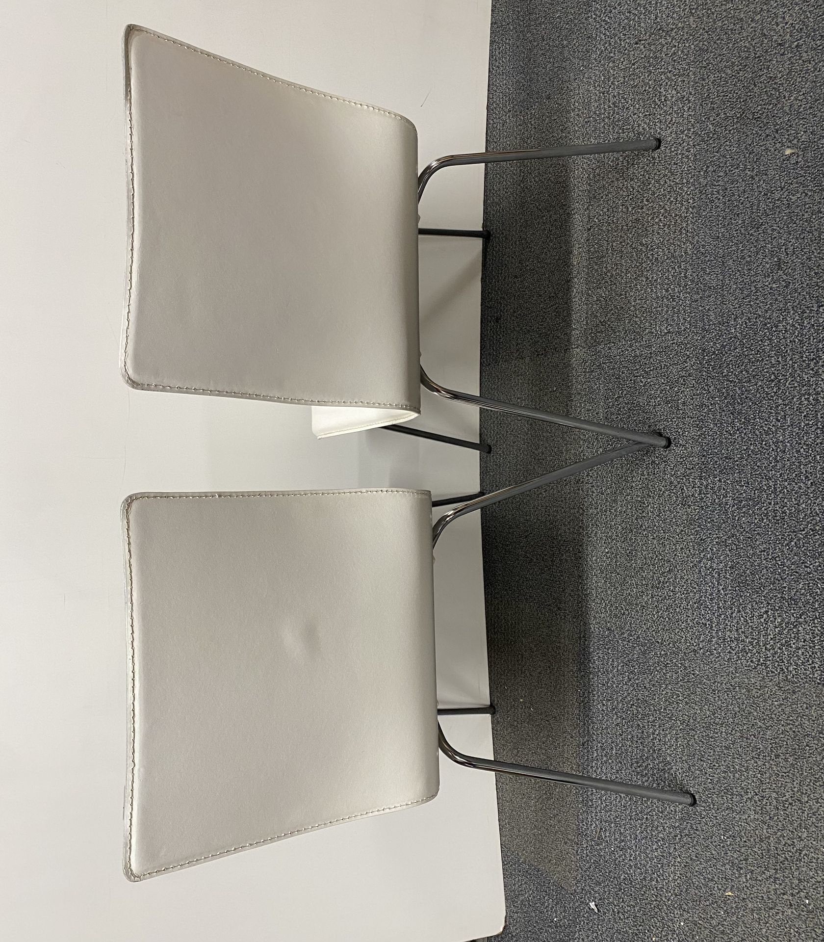 A pair of white leather upholstered and chrome chairs. - Image 2 of 2