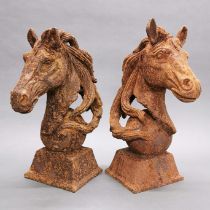A pair of cast iron garden horse head figures, H. 43cm.