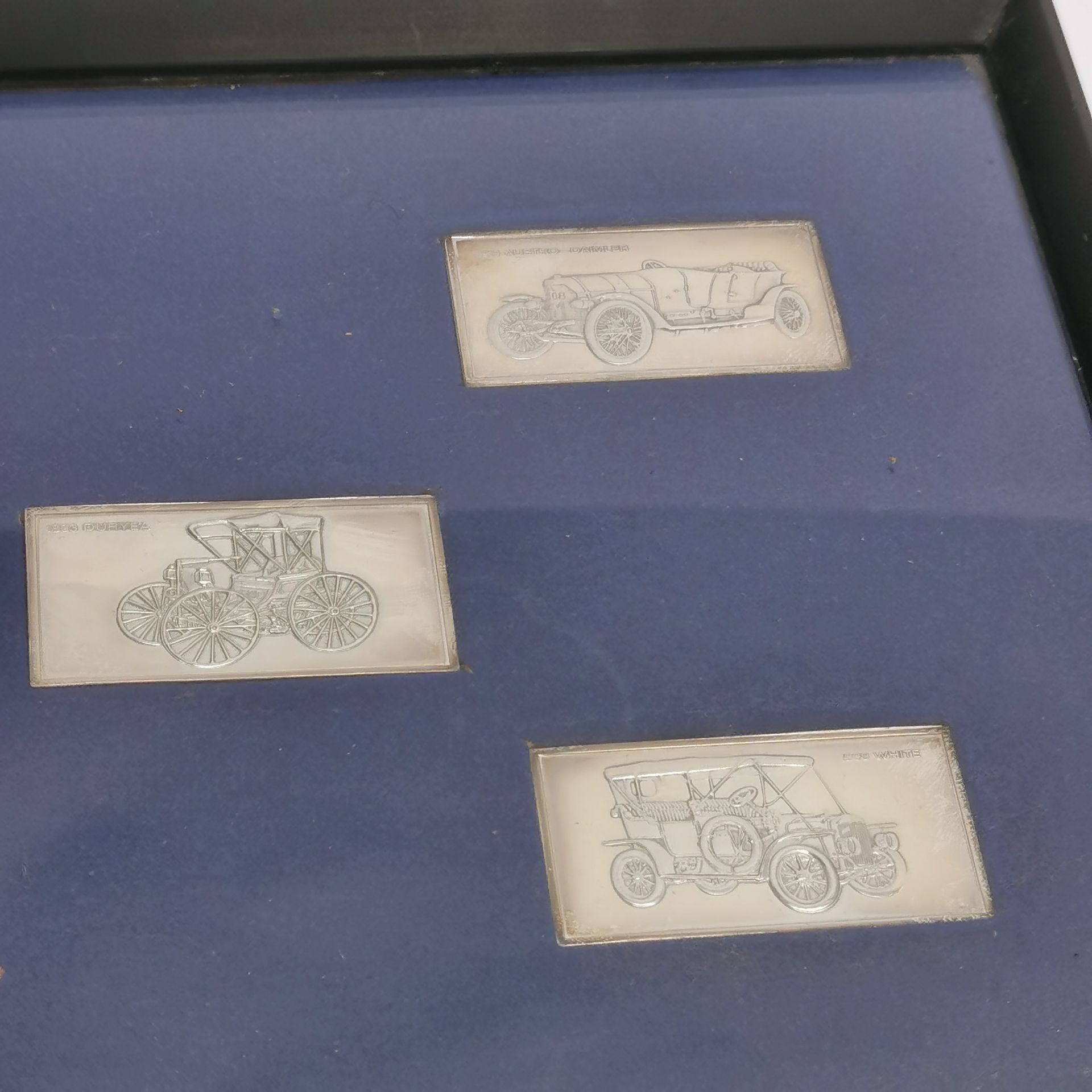 A framed set of five hallmarked silver motor car ingots, frame size 27 x 22cm. - Image 2 of 3