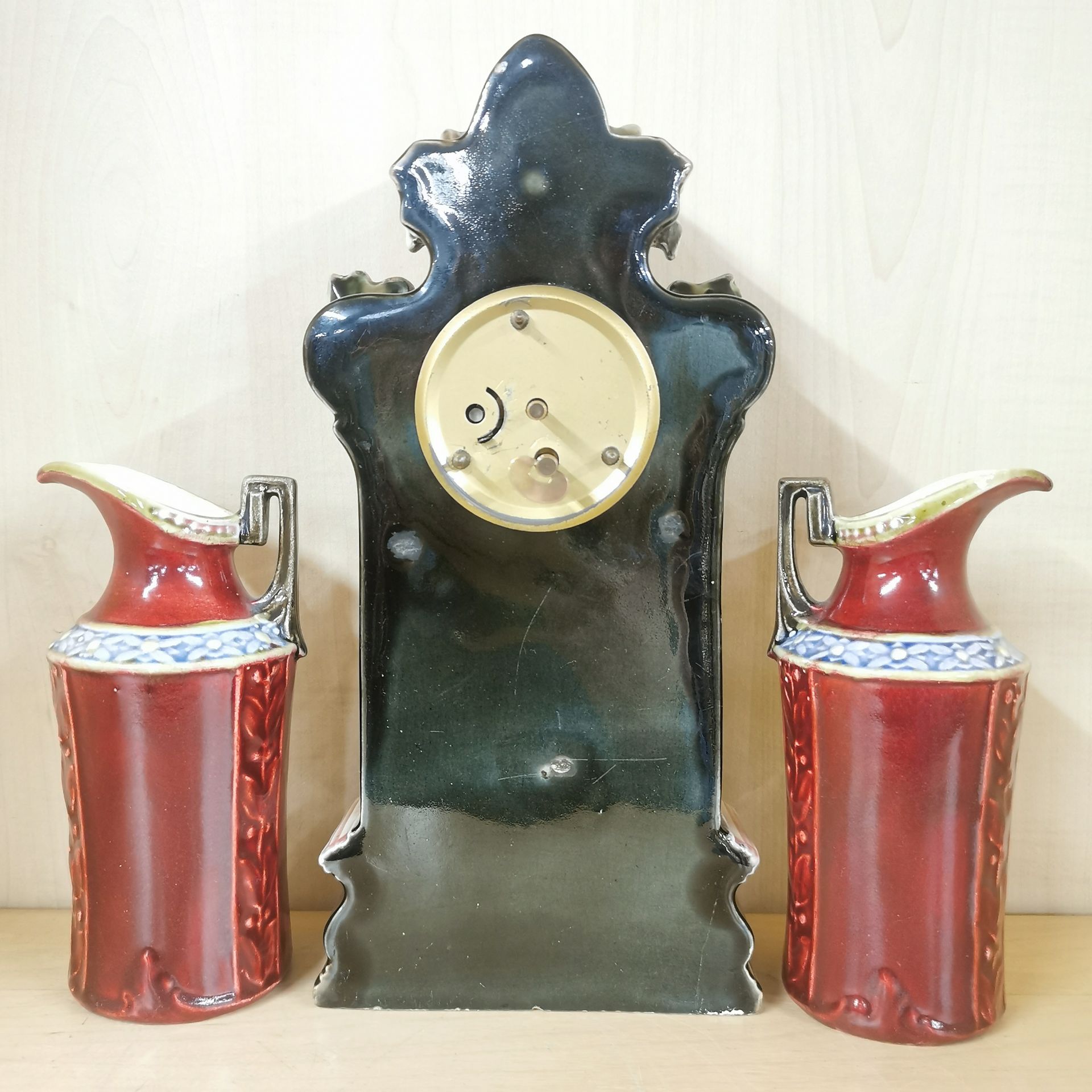 A pair of glazed ceramic portrait plaques, H. 24cm. Together with a ceramic clock and a pair of - Image 3 of 4