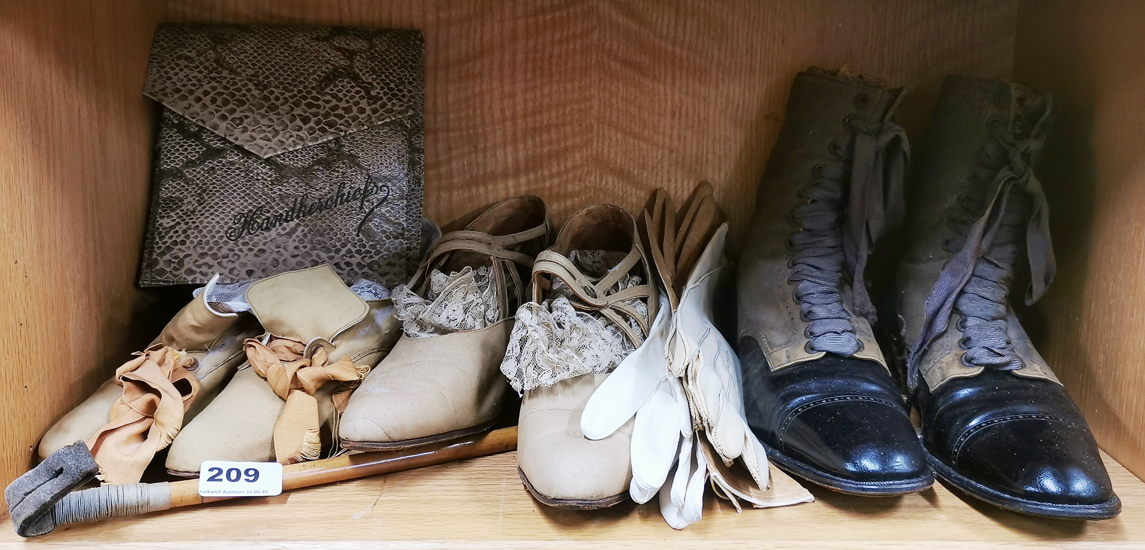 Three pairs of lady's antique shoes with leather gloves, handkerchief case and riding crop.