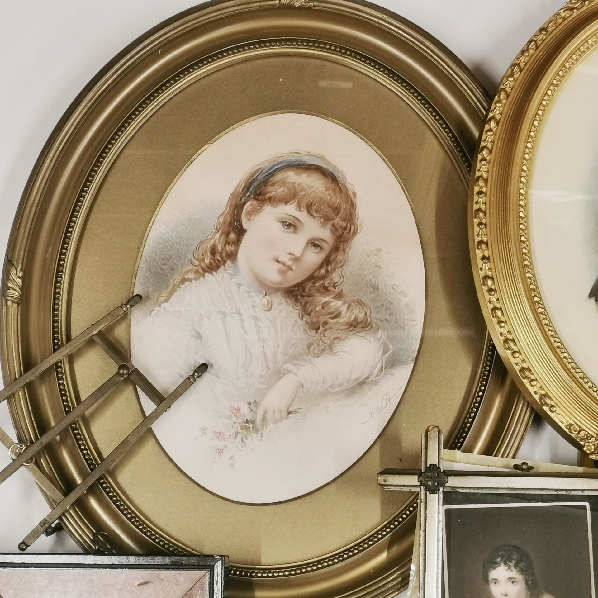 A Victorian framed hand finished photographic portrait of a young women, with a small easel, H. - Image 2 of 4