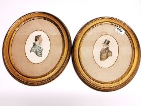 A pair of 19thC gilt framed hand painted miniatures of gentlemen, H. 32cm.