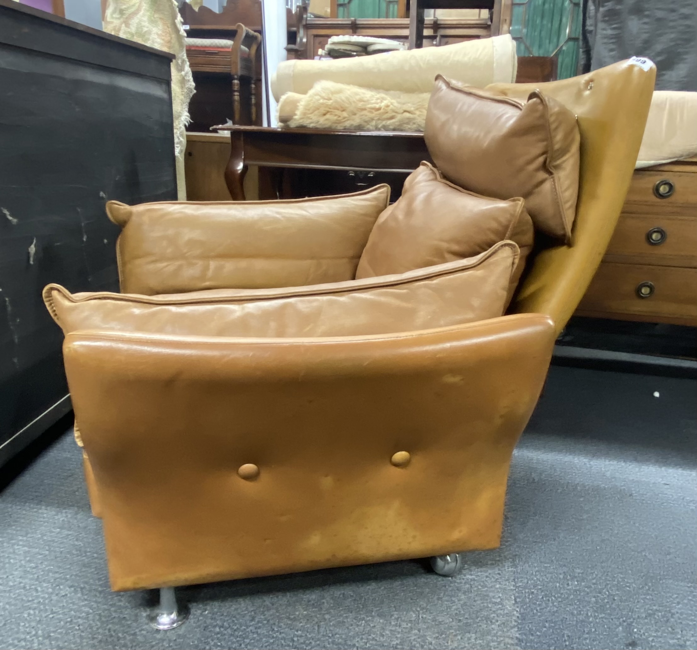 A 1970's Danish Svend Skipper high backed tan leather armchair, H. 100cm, W. 94cm. - Image 3 of 3