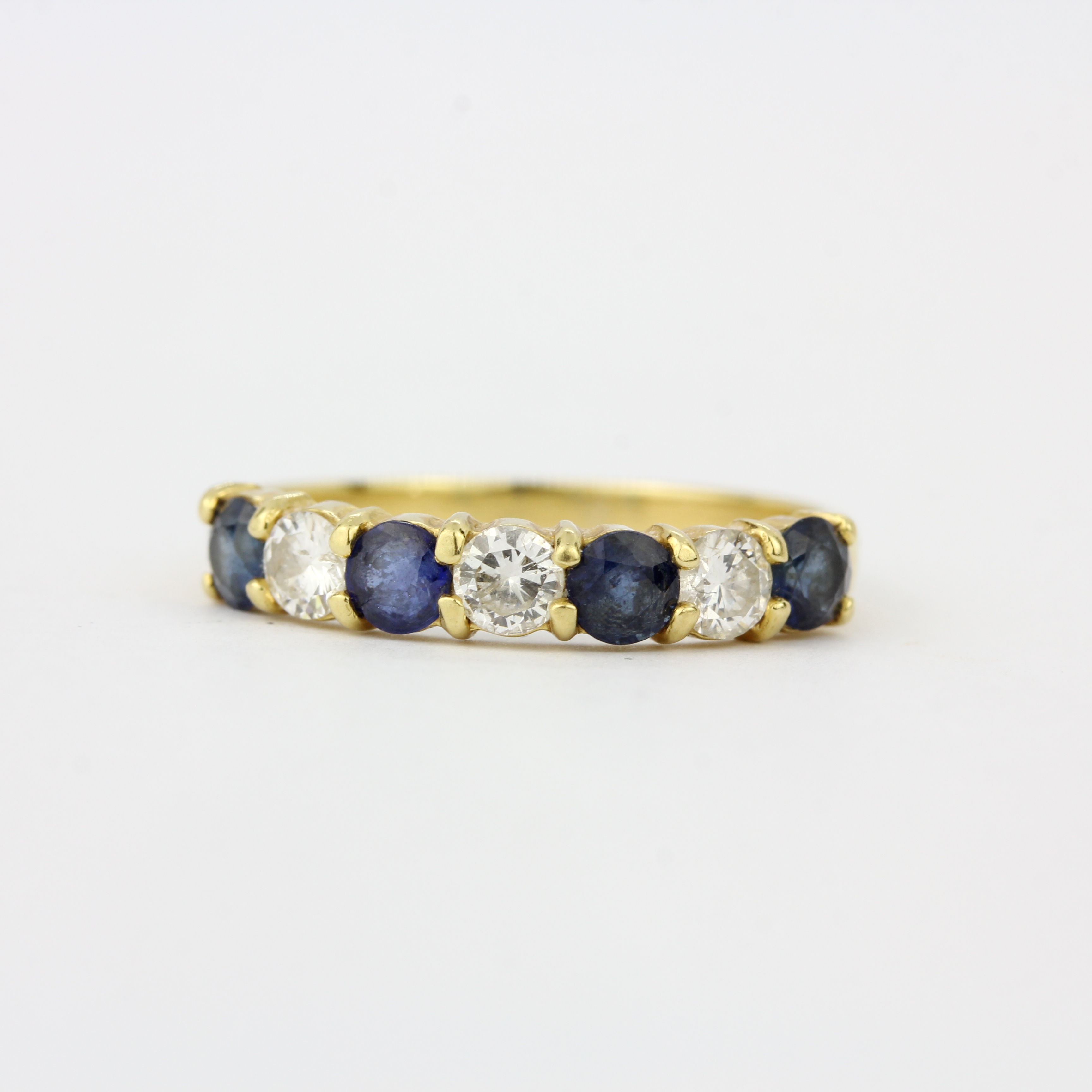 A 9ct yellow gold (tested,, worn hallmark) sapphire and diamond half eternity ring, approx. 0. - Image 2 of 3