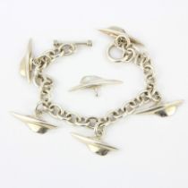 A heavy 925 silver charm bracelet of hand made yacht hull charms, L. 19cm. One charm detached.