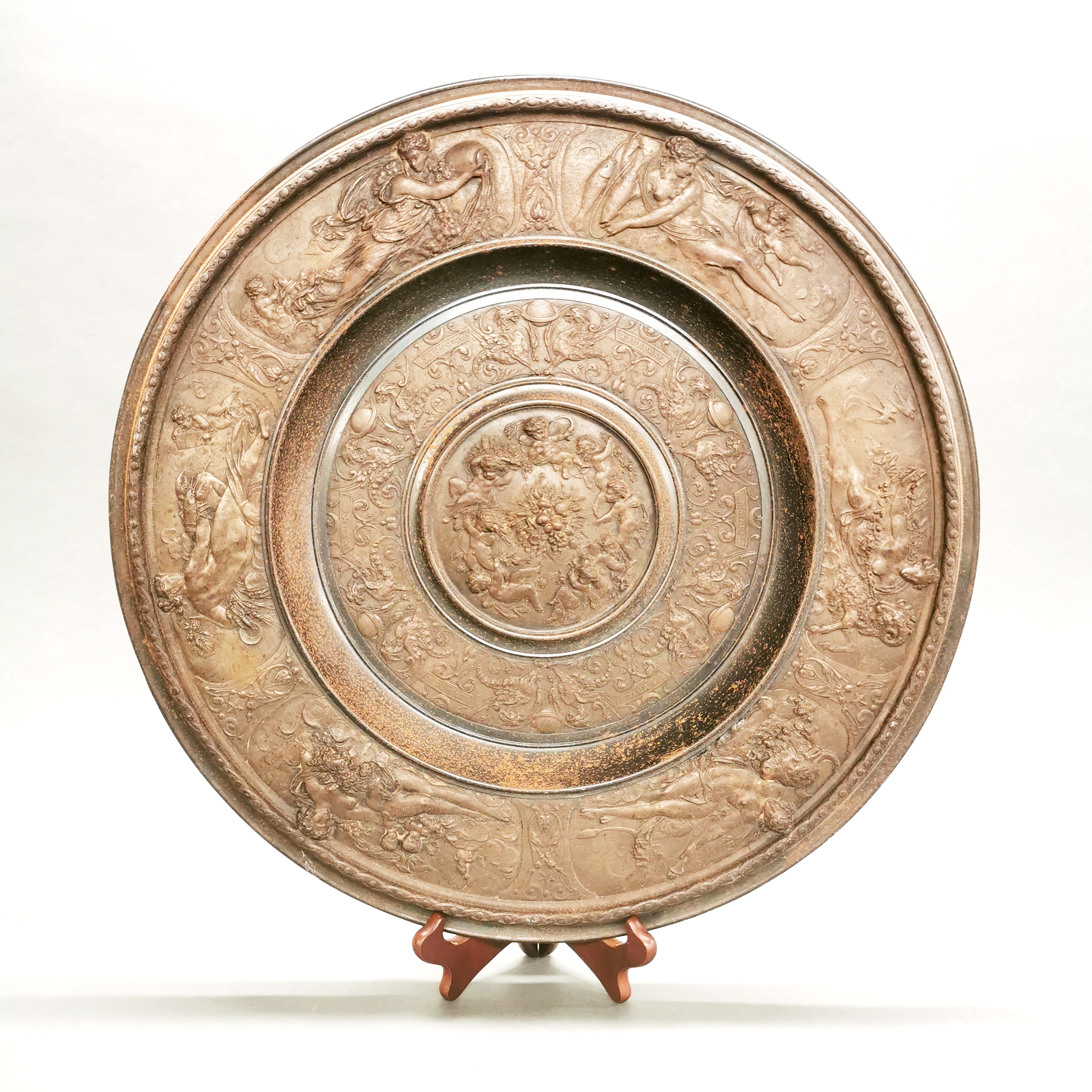 A large 19th century bronze and cast iron classical charger, dia. 52cm.