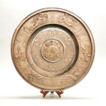 A large 19th century bronze and cast iron classical charger, dia. 52cm.