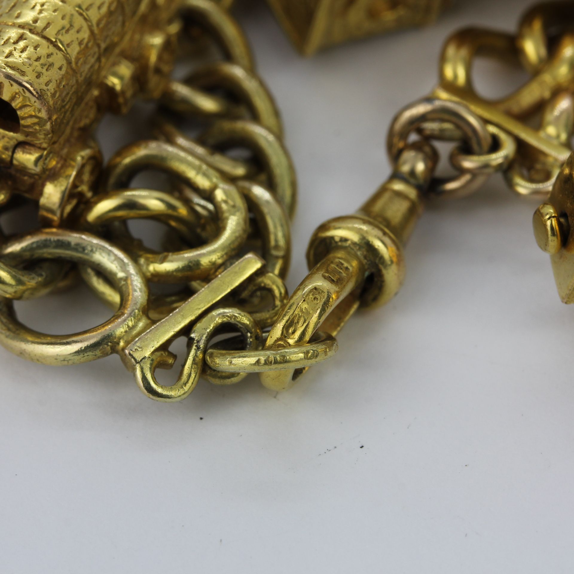 A 9ct yellow gold charm bracelet, L. 18cm. - Image 5 of 5