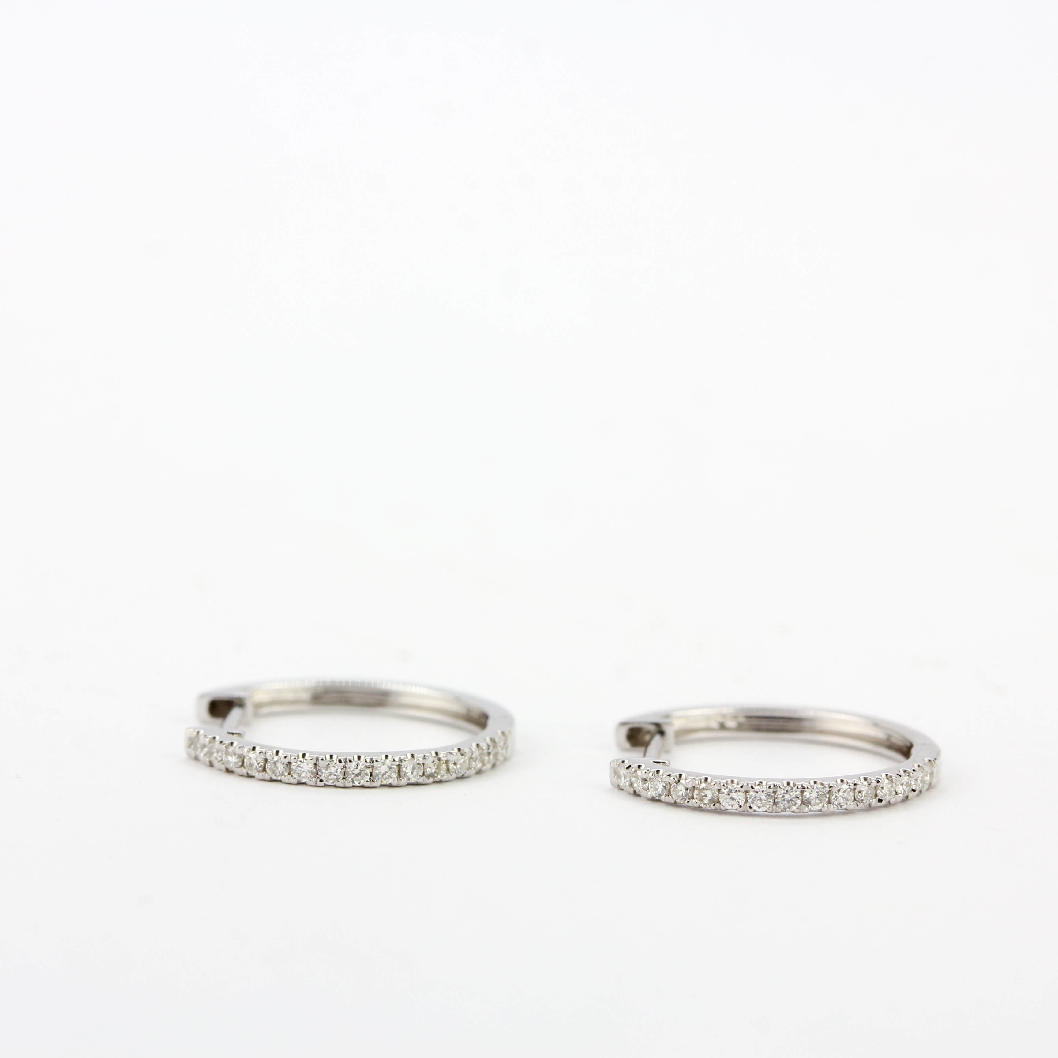 A pair of 18ct white gold diamond set hoop earrings, L. 1.3cm. - Image 3 of 4