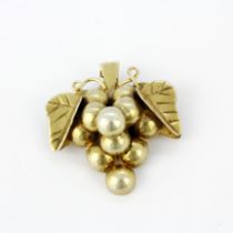 A gilt metal grape shaped pendant, L. 3.6cm.