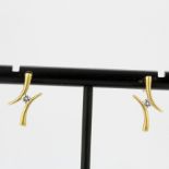 A pair of 9ct yellow gold diamond set earrings, L. 1.6cm.