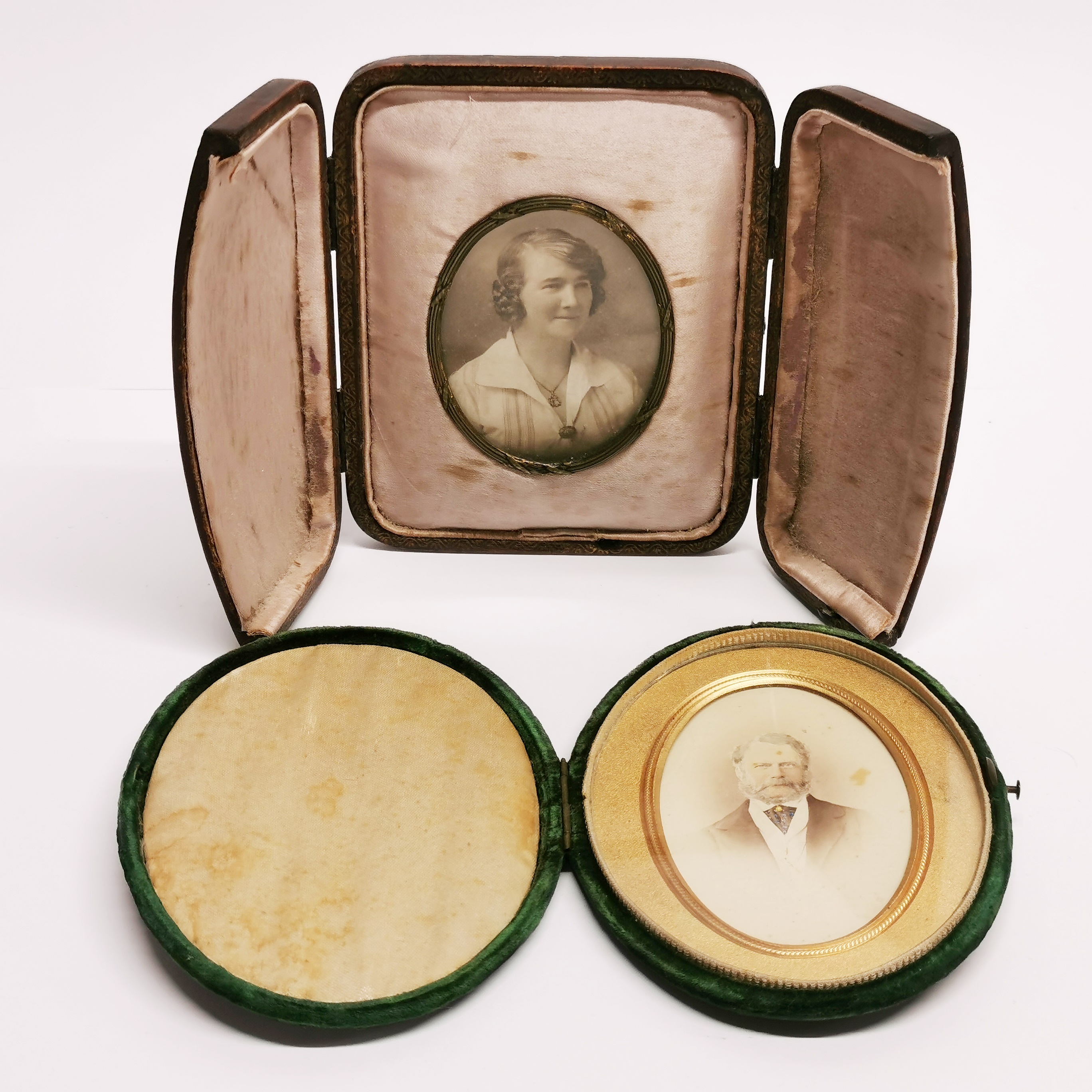 Two cased photographic portrait miniatures, case H. 13cm.