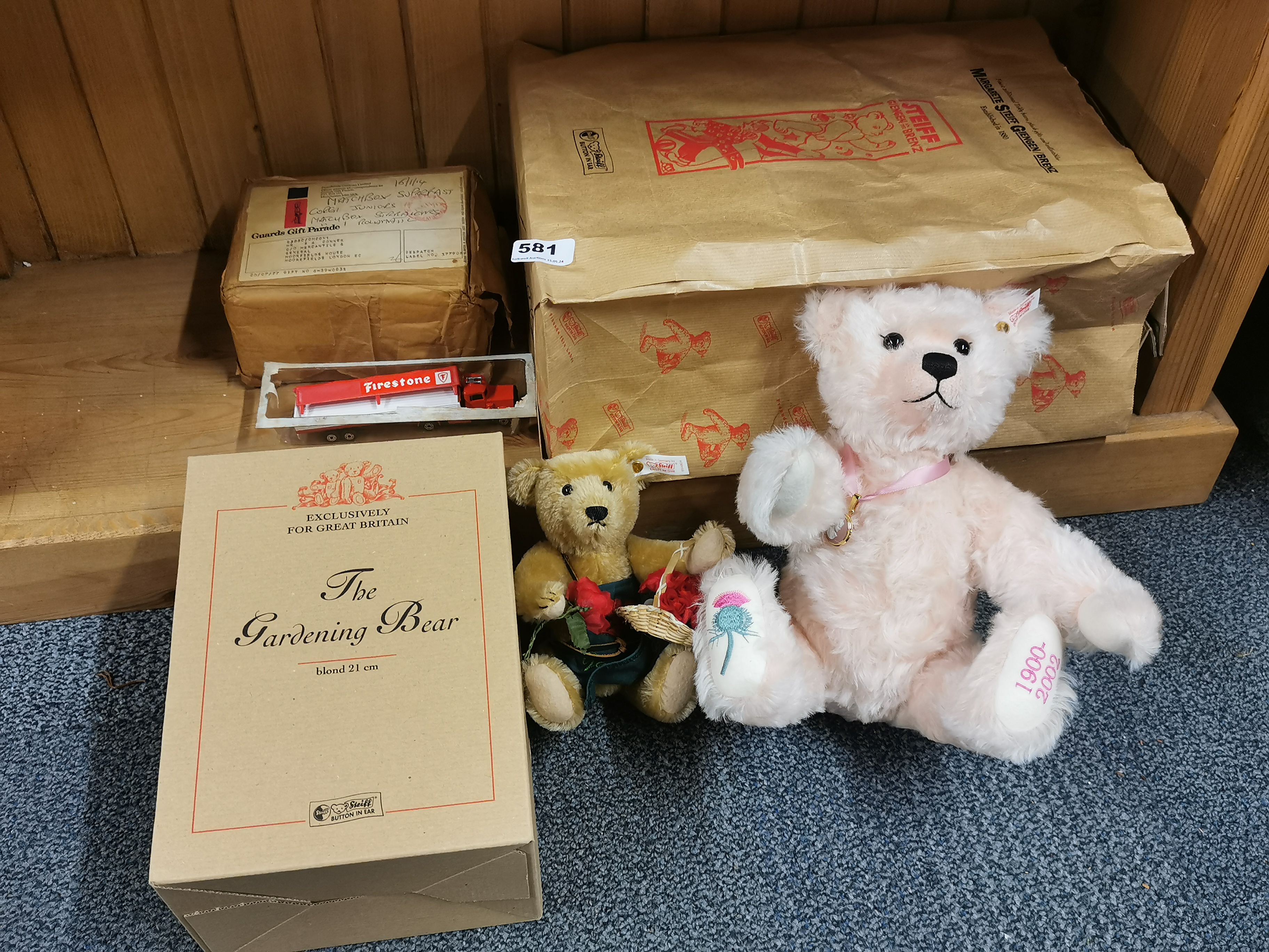 A Steiff pink teddy bear 1900/2002, with a further Steiff bear, both boxed.