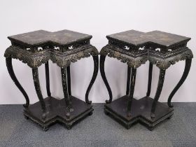 A pair of interesting Chinese lacquered carved wood stands, W. 86cm, H. 90cm.