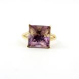 A 9ct yellow gold ring set with a fancy cut ametrine, ring size S.