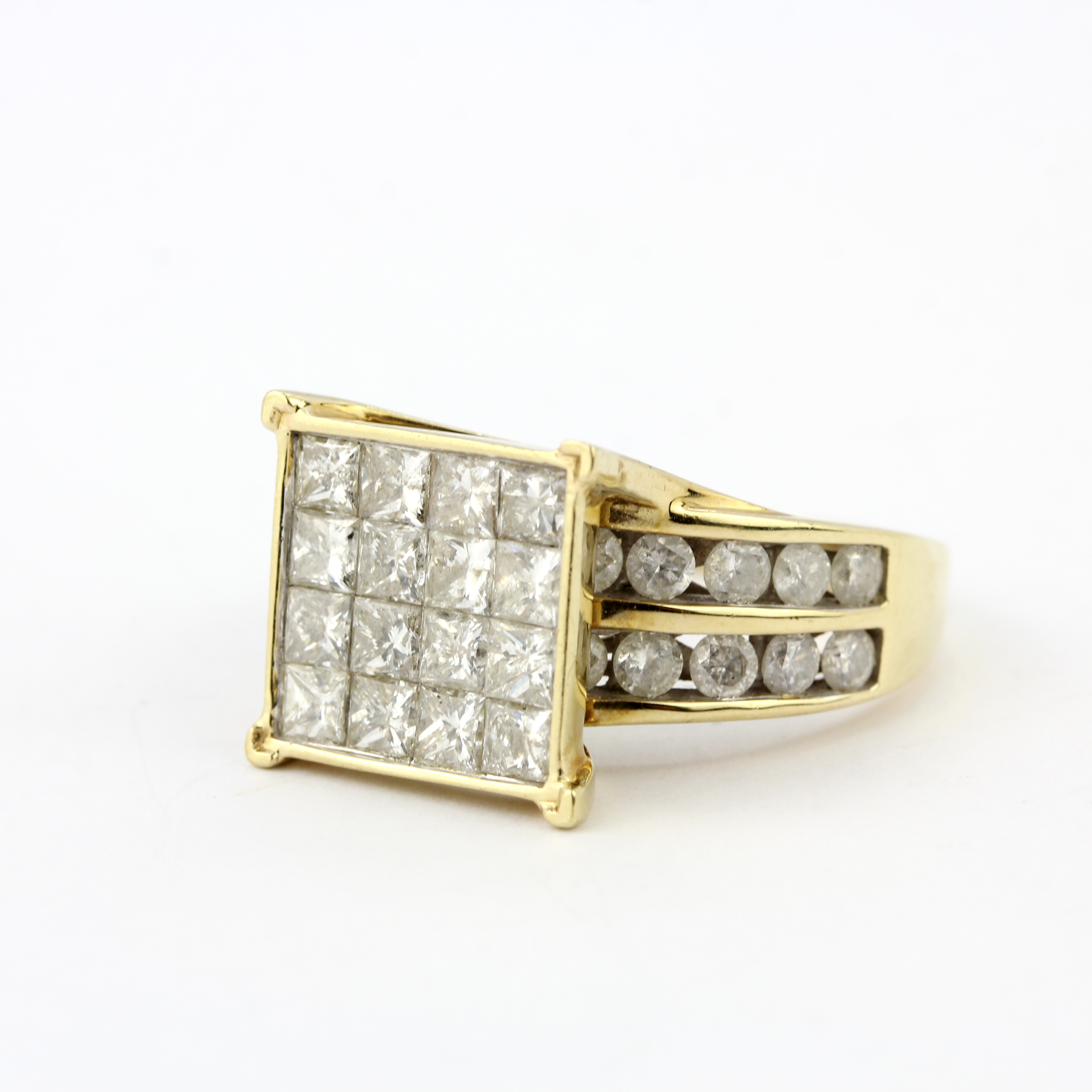 A 9ct yellow gold ring set with princess and brilliant cut diamonds, approx. 4ct overall, ring - Image 2 of 3