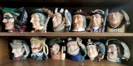 A group of twelve large Royal Doulton character jugs.